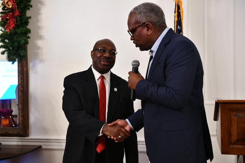 two men shaking hands